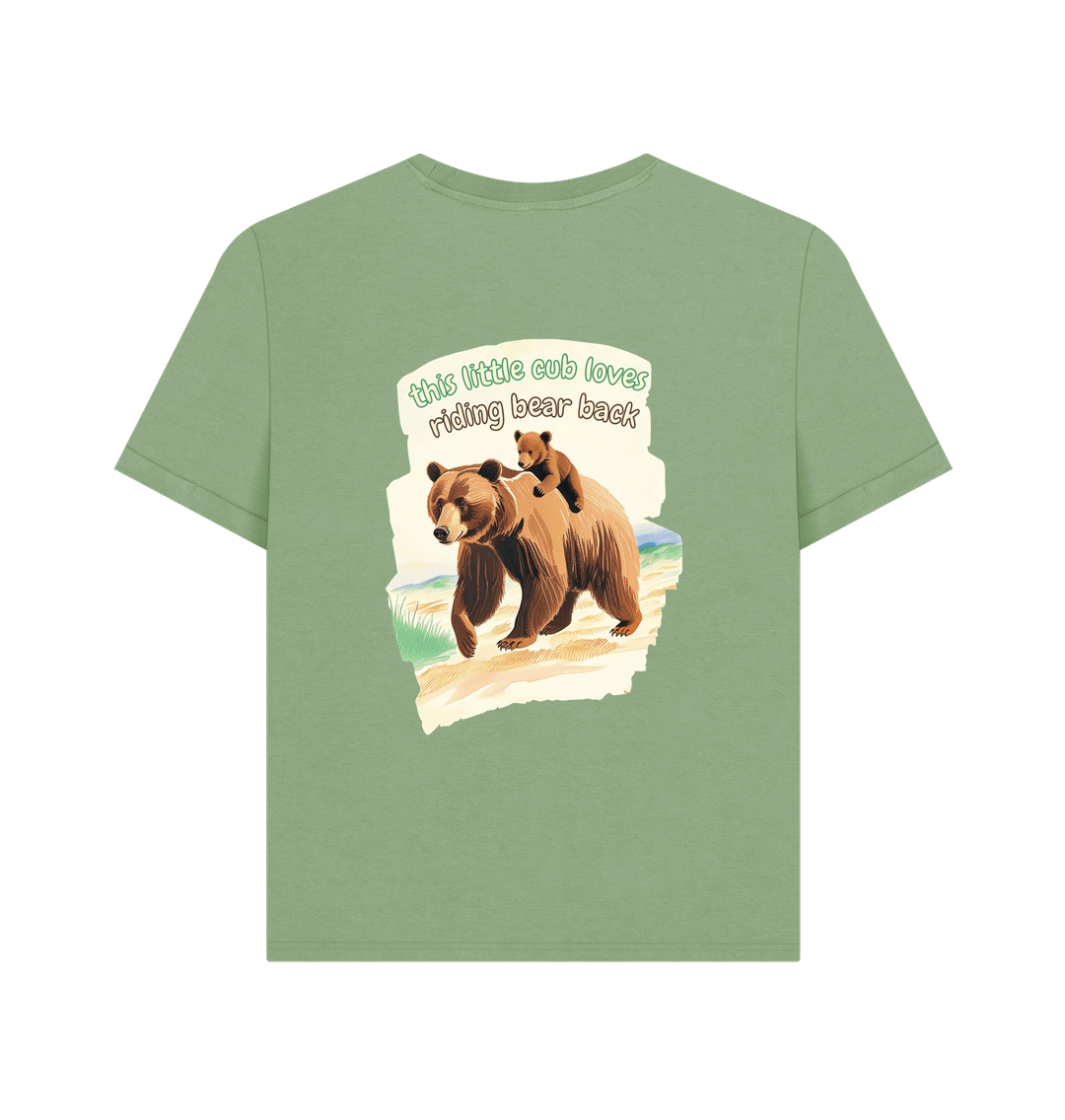 this little cub loves riding bear back
