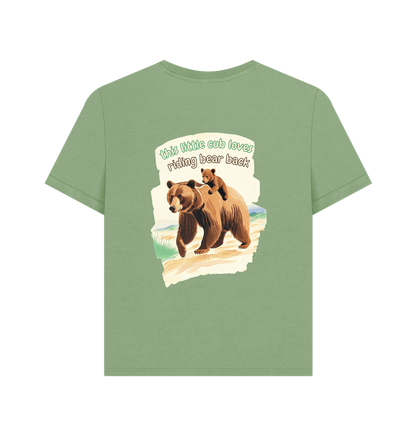 this little cub loves riding bear back